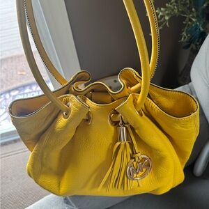 Michael Kors Bright Yellow Leather Drawstring Shoulder Bag with Tassel Charm